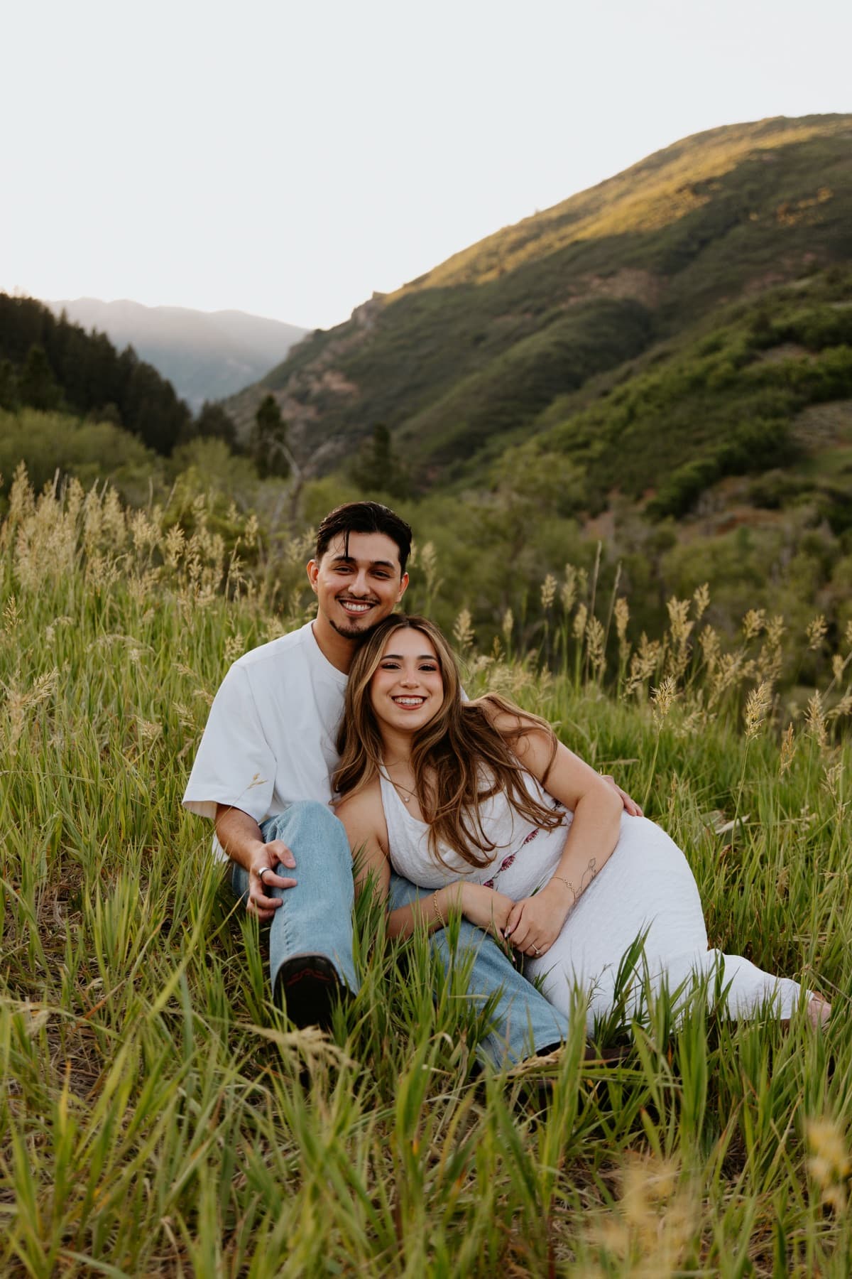 Sitting together on a green hillside